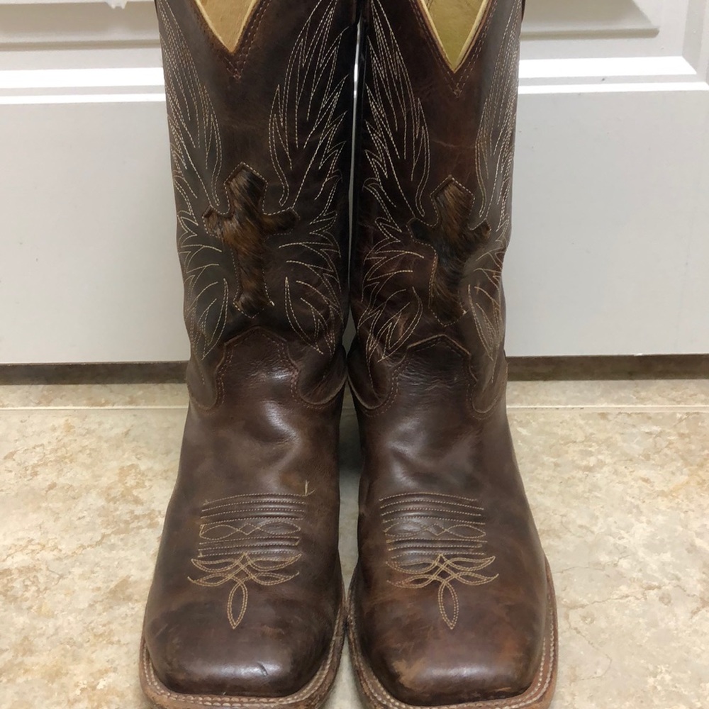 Brown Leather Tony Lama boots.
